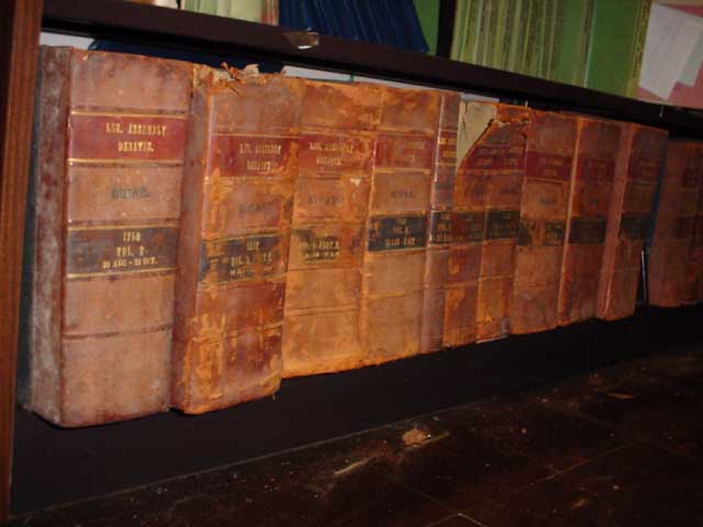 Shelves of 1950s Bihar Legislative Debates volumes. CLICK next